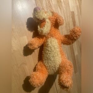 Disney store exclusive Tigger. Excellent condition. Fuzzy & very soft